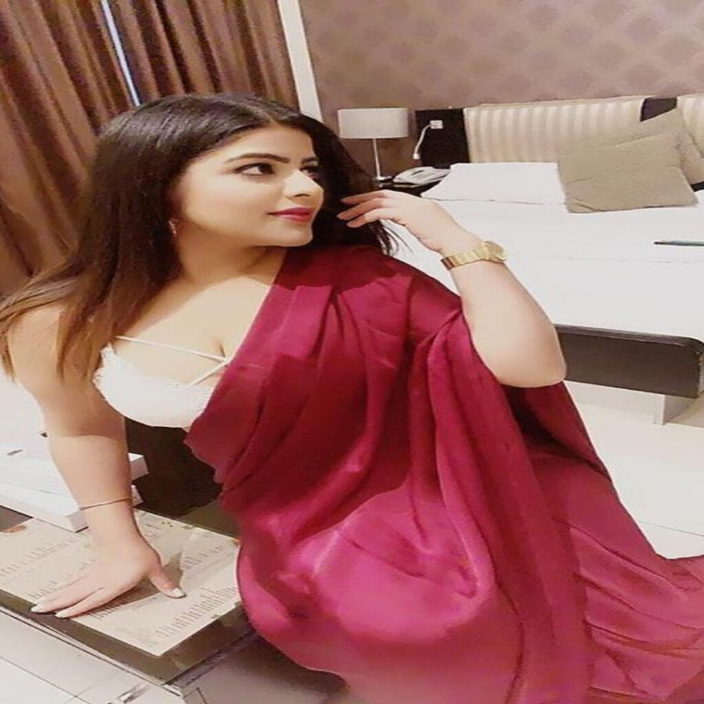 A SEXY GIRL 22 YEARS OLD NAME IS TINA IN MAROON SAREE GIVING SEXY POSE